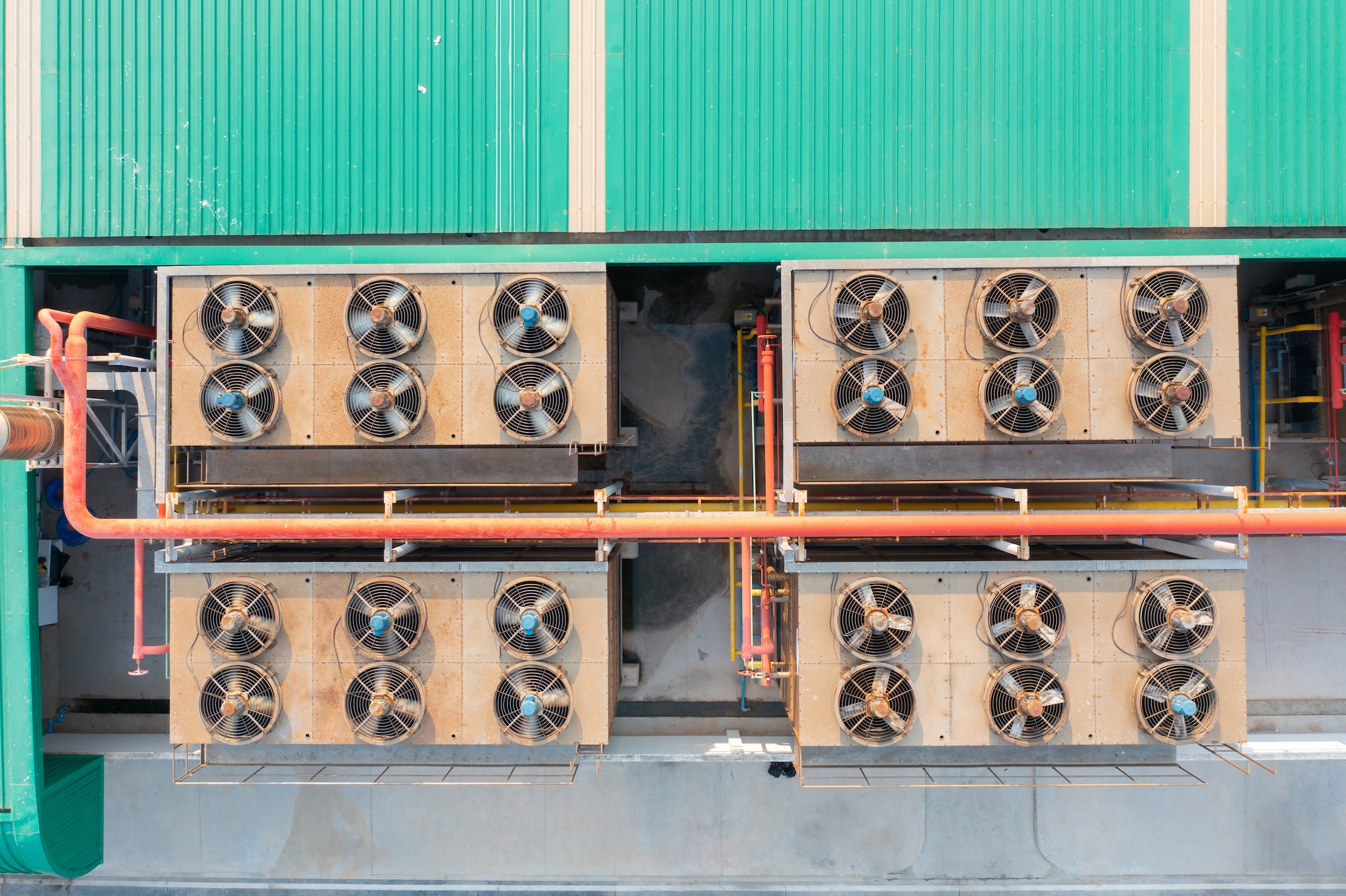 Metal sheet corrugated roof on rooftop of industry factory. Steel structure of station building